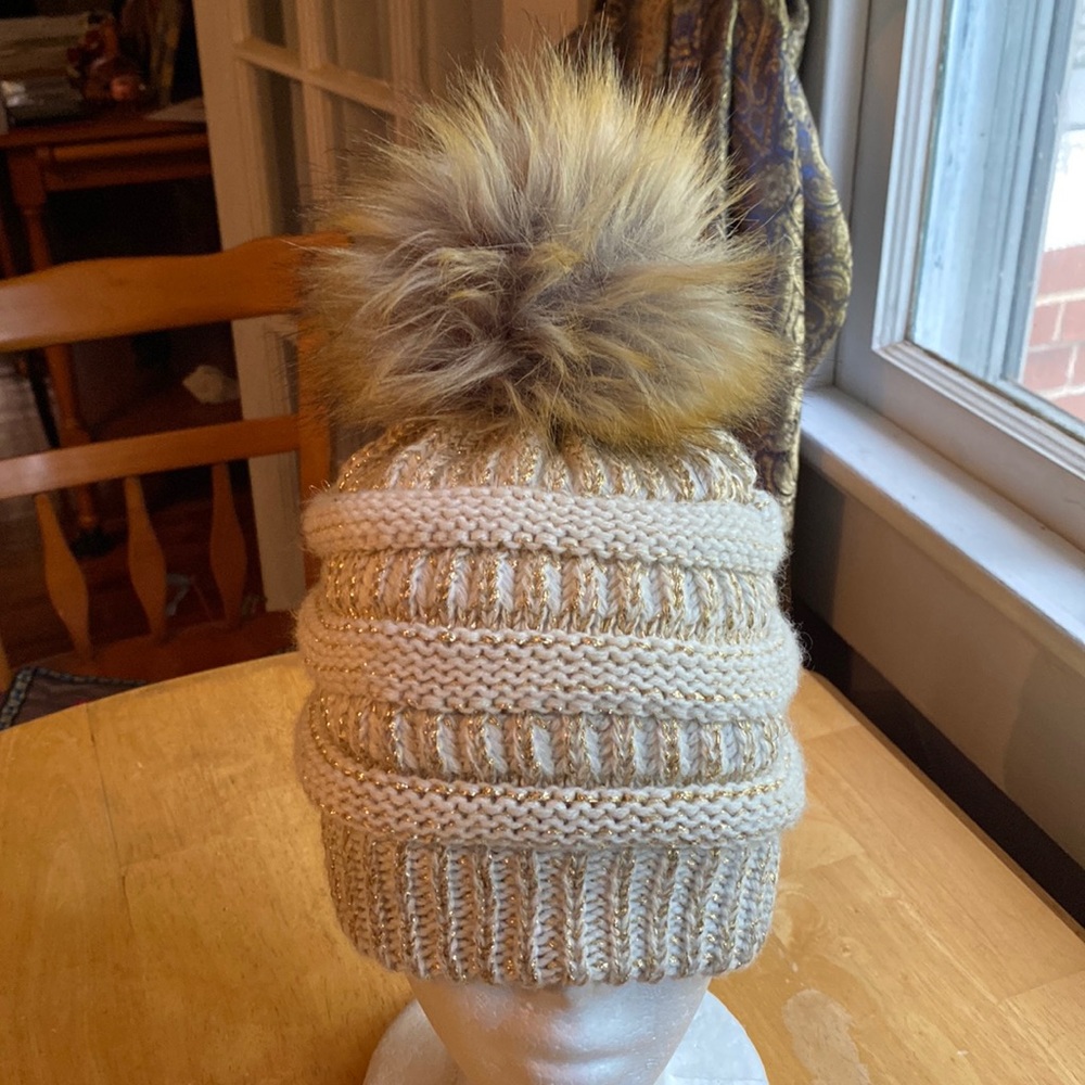 V! Cream gold C.C Beanie style with pompon hat like new
